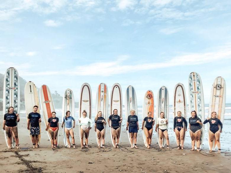 2019 GVSU HTM Costa Rica students learning to surf